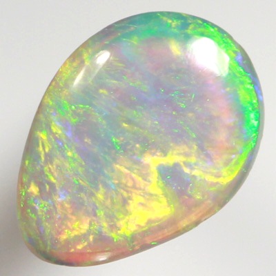 SOLID CRYSTAL OPAL Bright green and orange sparkle over blue green